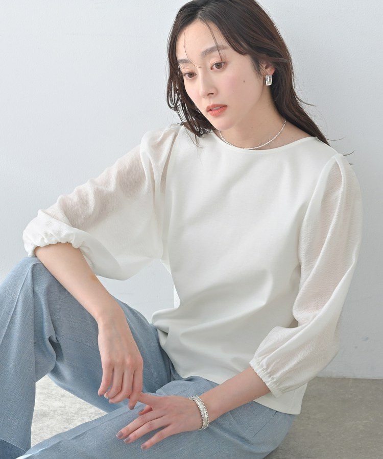 ポンチ袖ボリュームトップス1