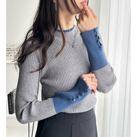 配色デザインくるみボタン付リブニット