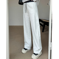 ニット複合生地の暖かで柔らかいスウェットシミターカジュアルパンツ