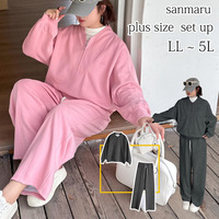 ハーフジップトップスとシミターパンツのスウェットスーツ