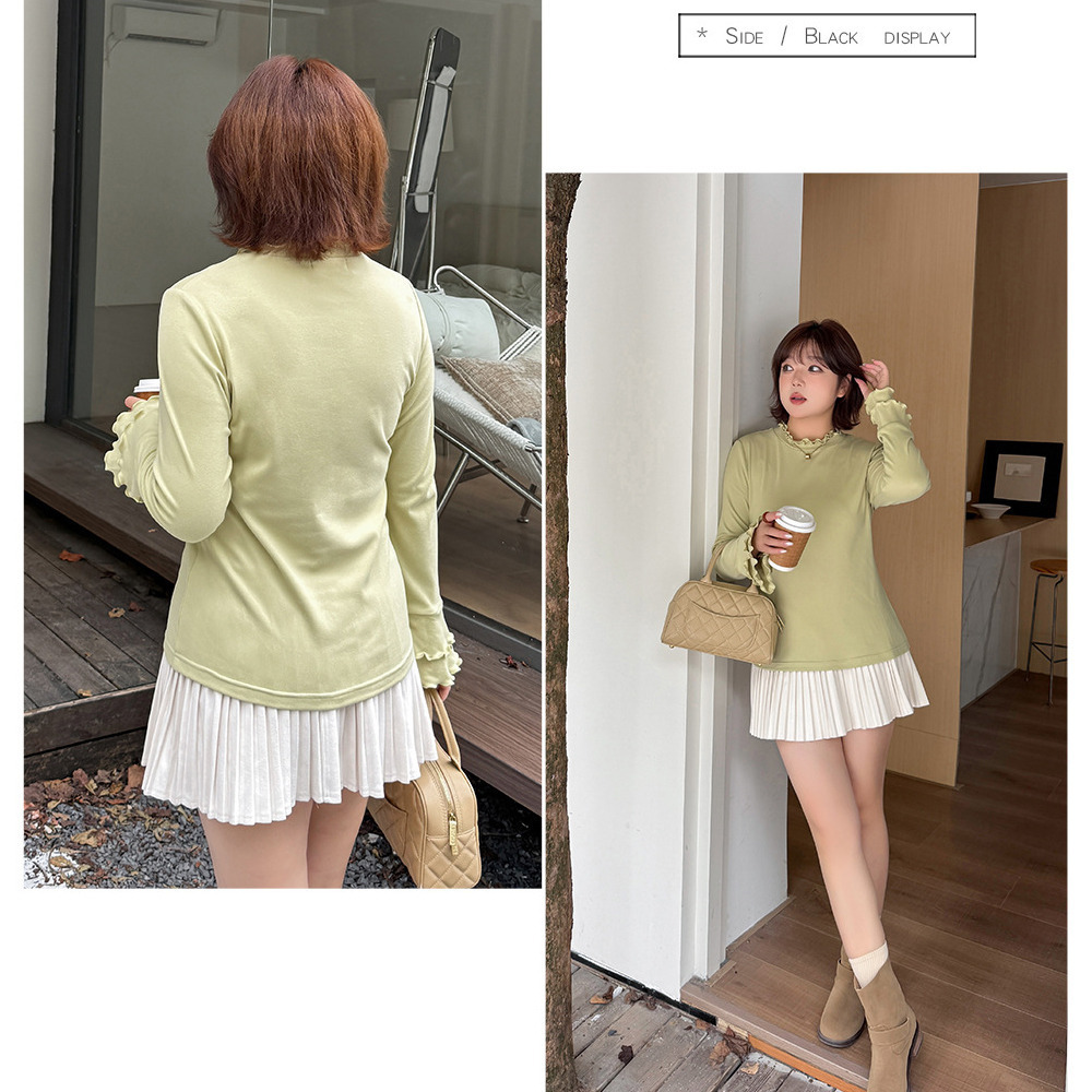 二重フリルのスタンドカラーとベルカフのフィット感のあるトップス7