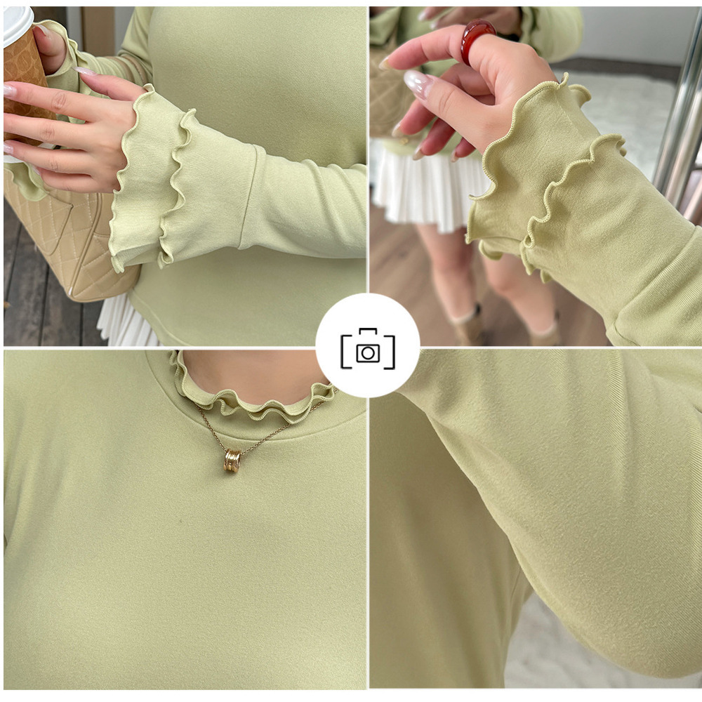 二重フリルのスタンドカラーとベルカフのフィット感のあるトップス8