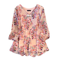 レトロで華やかな花柄のプルオーバーブラウス